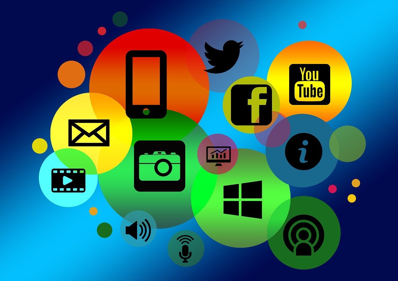 Colorful digital icons for email, social media, video, and search, symbolizing online visibility and SEO presence