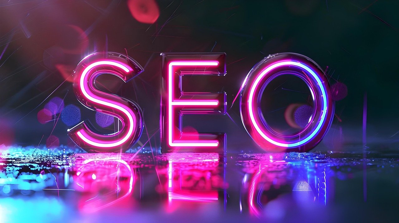 Neon SEO letters glowing in pink and blue lights, symbolizing the power and visibility of search engine optimization